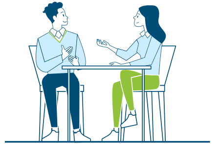 Two people sitting and talking